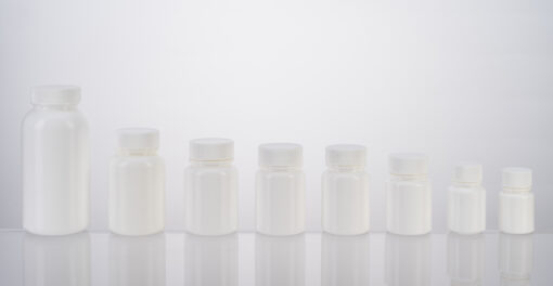 White plastic bottle for medicine pill